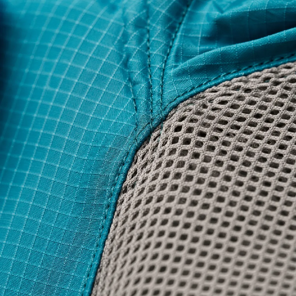 Macro of the quick-dry shirt's mesh underarm gusset stitched into the ripstop body.